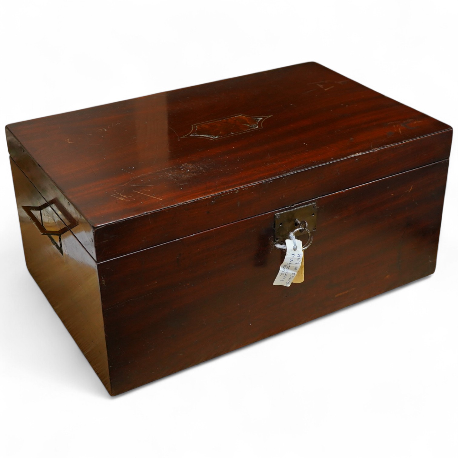 An early 19th century mahogany correspondence box with secret compartment, campaign style flush handle concealing button release, with key, 45cm wide